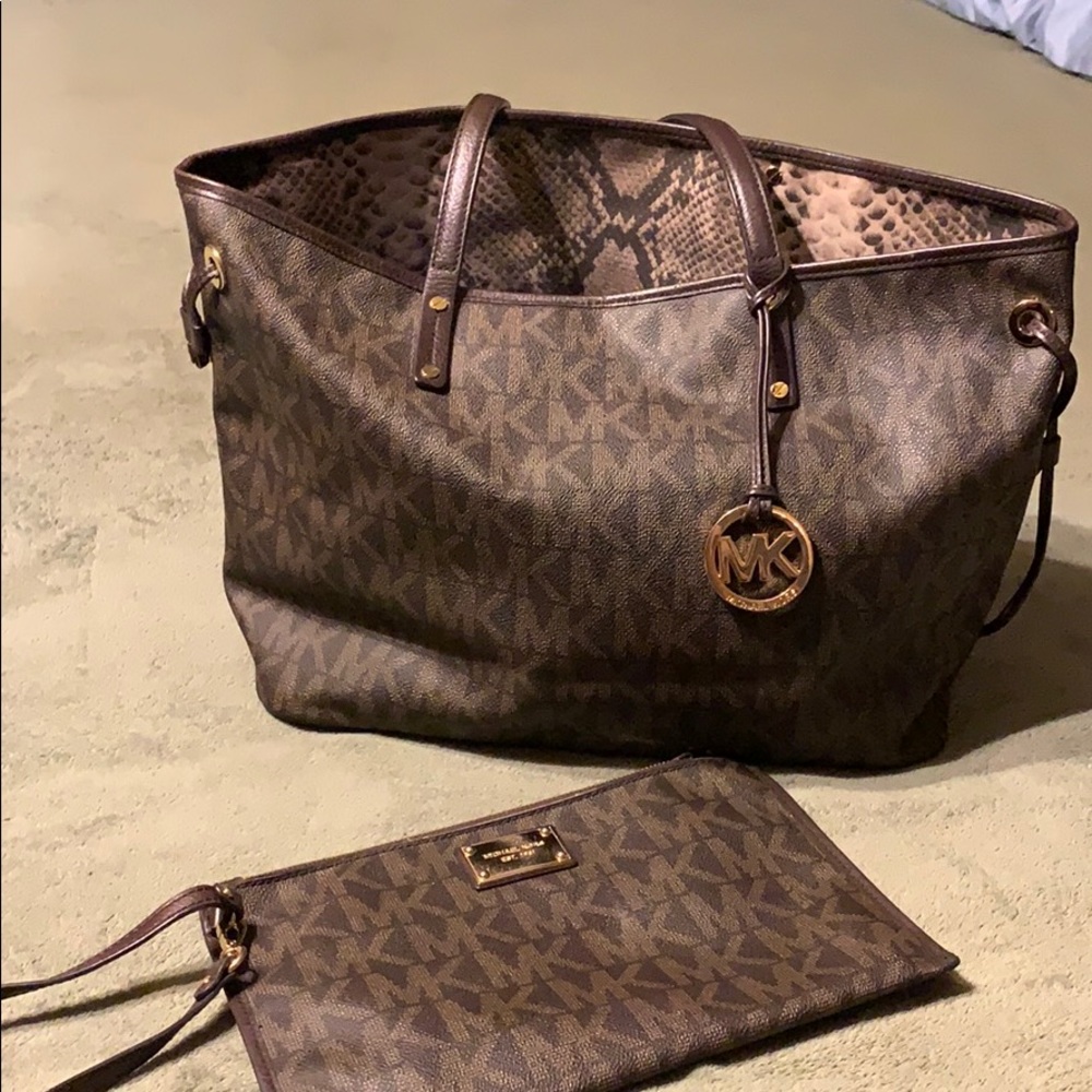 Michael Kors Handbag and matching wristlet/wallet.